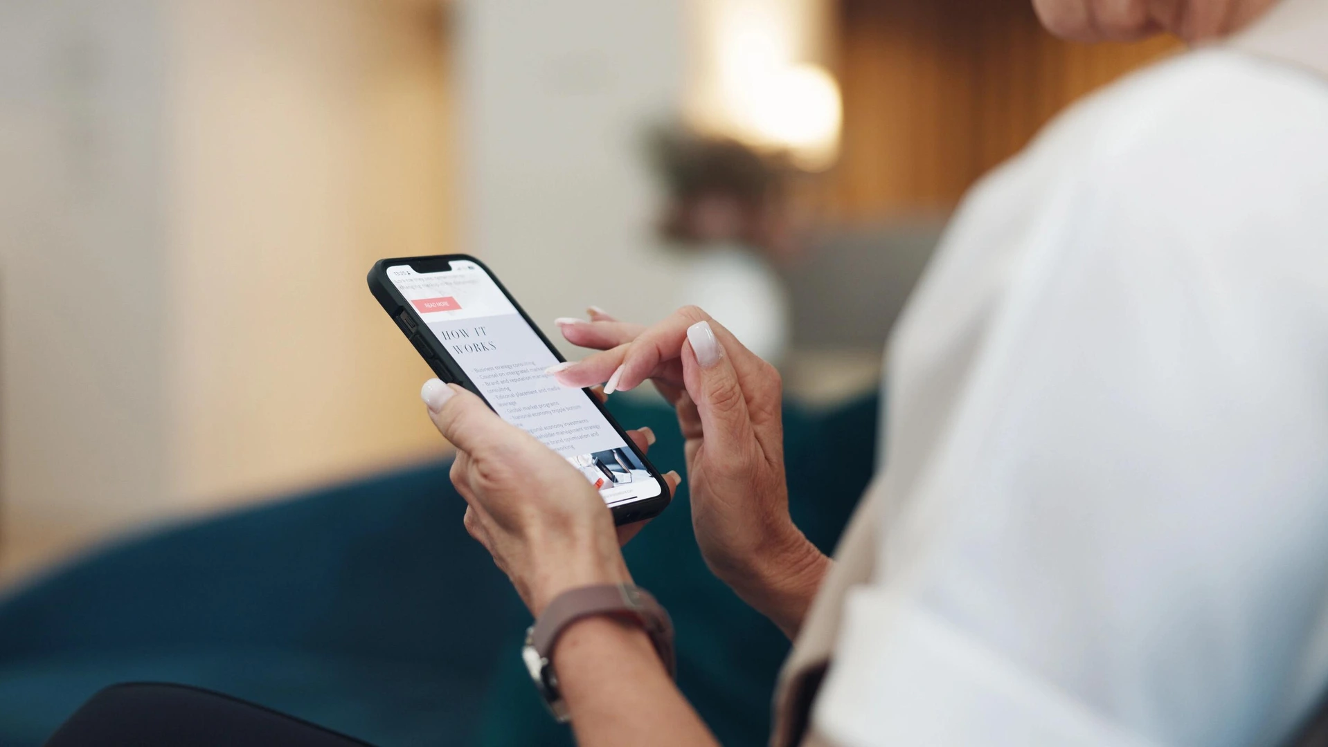 Woman looking at phone screen